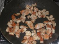Chicken in milk-garlic sauce in a frying pan Chicken with milk recipe