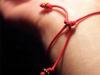 Red thread on the hand: magic, meaning, how to wear it correctly, where to buy